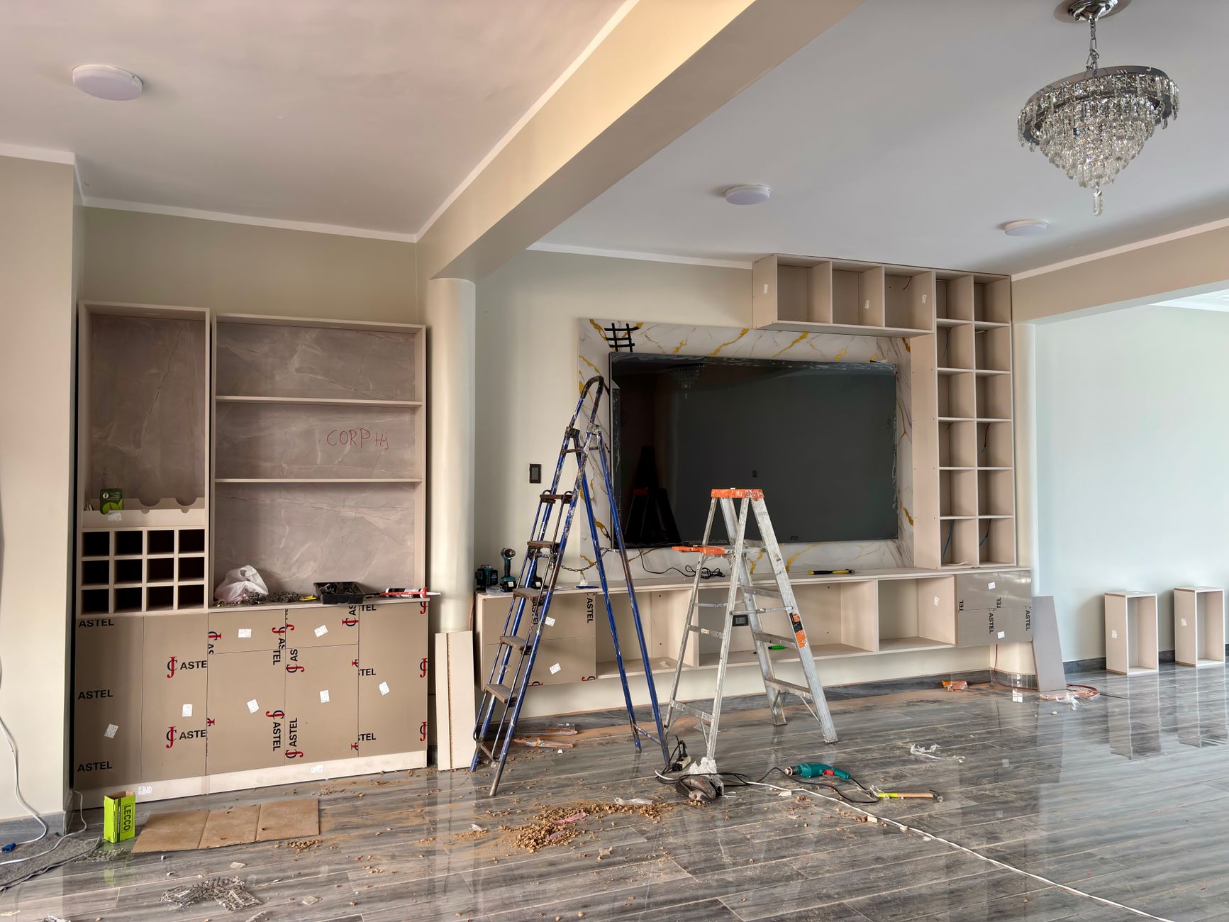 A remodeled home kitchen with cabinets and counters